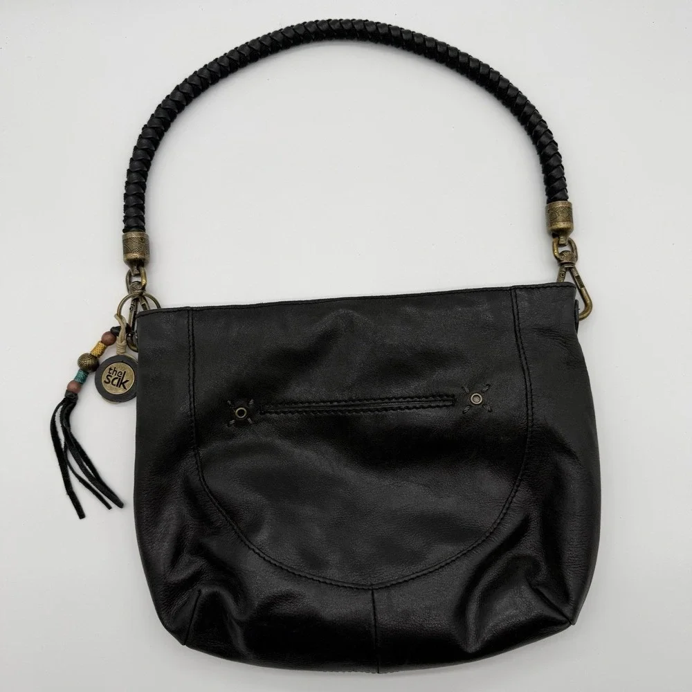 The Sak Indio Demi Leather Hobo Bag Braided Strap Whipstitch Charm Logo Black